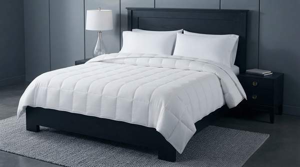 Editorial illustration for How to Choose a Down-Alternative Comforter: Matching Fill Material to Your Sleep Style